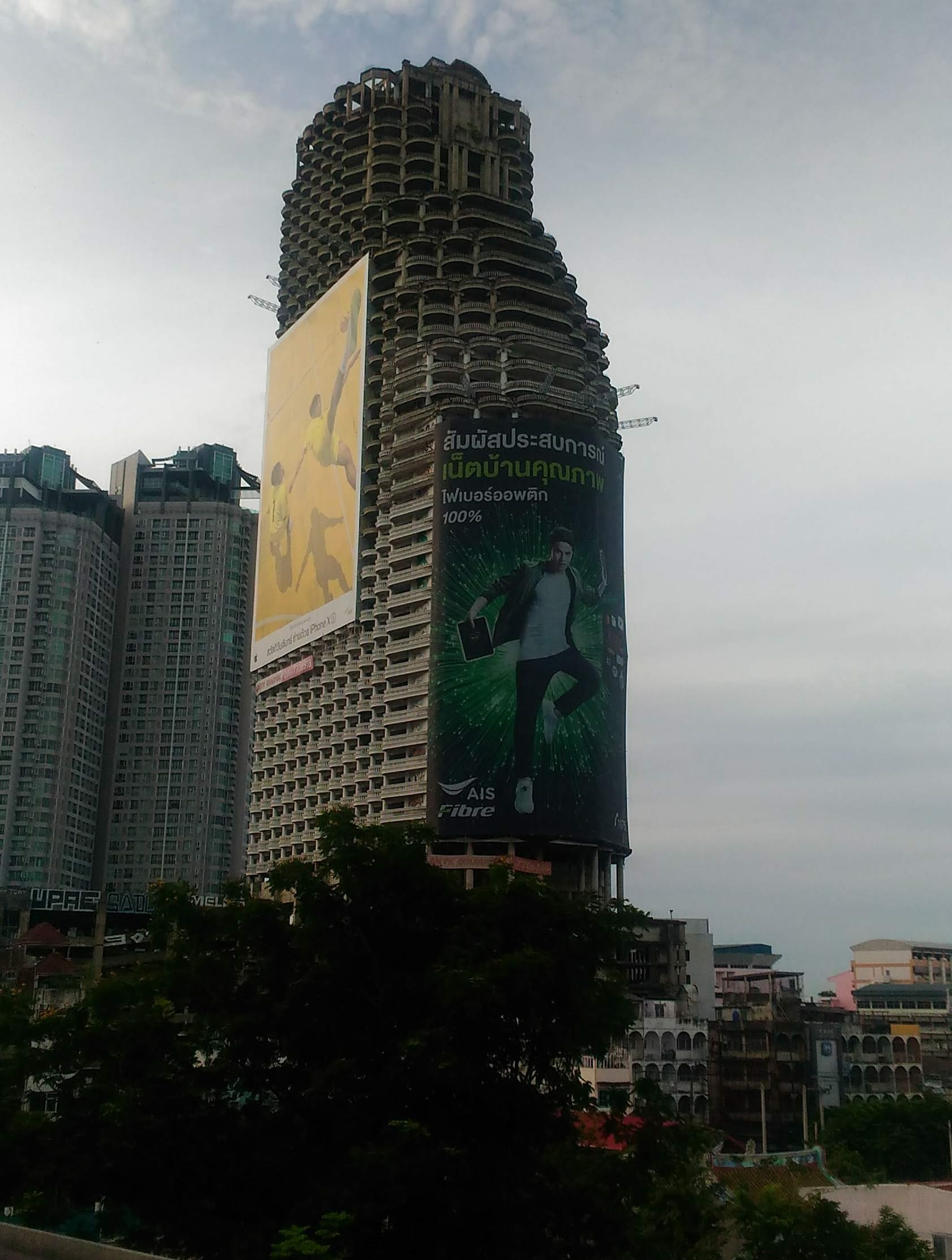 Sathorn Unique Tower located in Sathorn major commercial district in Bangkok - front view